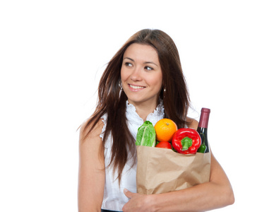 女子持充分的食品杂货购物袋