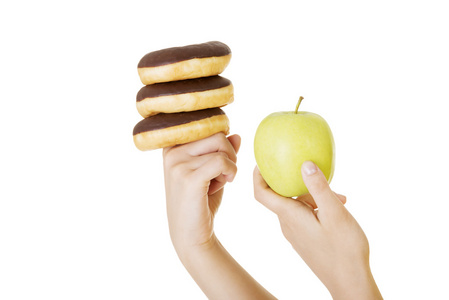 甜甜圈或绿色苹果艰难的抉择