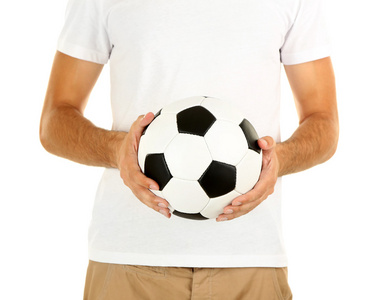 持有球，孤立在白色的年轻足球运动员