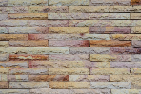 显示自然颜色和纹理，横向模式的砂岩砖墙壁
