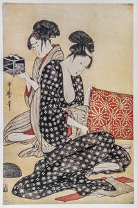 制作衣服的妇女。北川木版。传统的日本雕刻浮世绘