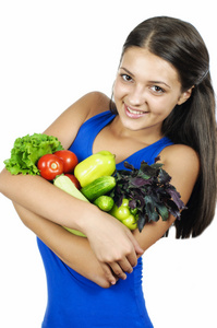 蔬菜在白色背景上的女孩