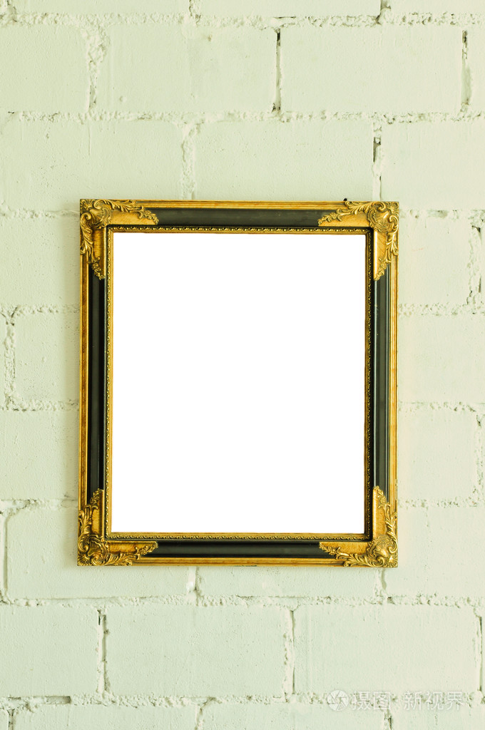 白墙上的老式黄金图片框架照片-正版商用图片1cogd2-摄图新视界