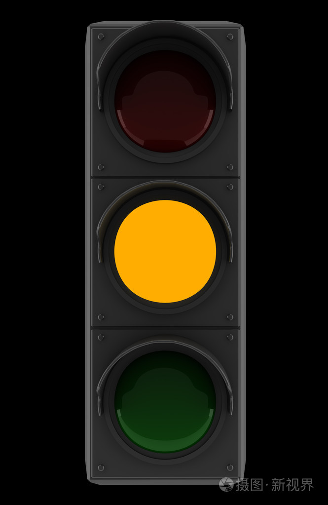 孤立在黑色背景上的黄色交通灯