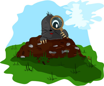 用放大镜在土丘上的痣照片