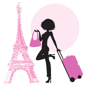 年轻女子在巴黎的手提箱