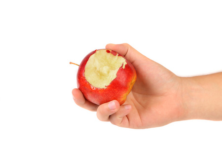 只手拿着被咬的红苹果