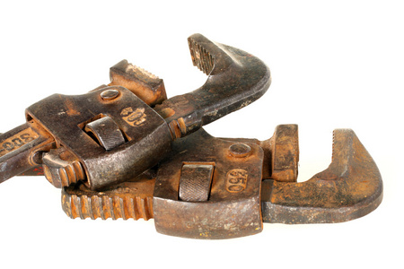 旧的老式红处理水管工管钳照片