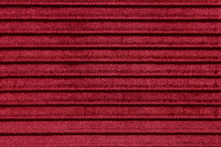 红色的 stiped 织物纹理或背景