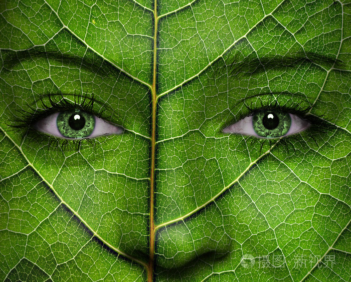叶纹理和绿色眼睛的女人脸
