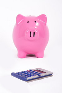 粉红猪存钱罐和计算器