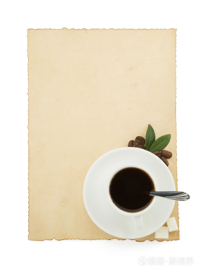 杯咖啡和羊皮纸上白