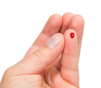 糖尿病患者的手指，使血糖水平的血液测试