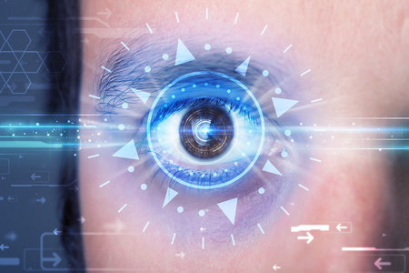 技术眼睛看着蓝色虹膜的数码人