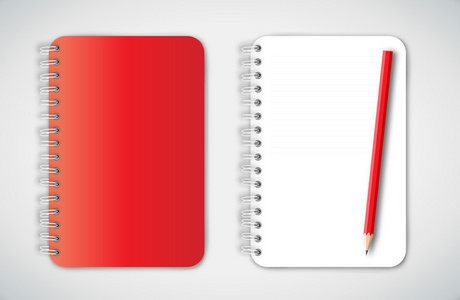 红色笔记本和铅笔