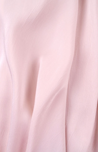 淡粉红色丝绸悬垂 背景或纹理。粉红色丝绸材料