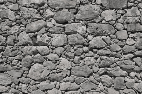 大和小石头做的黑灰色旧墙上