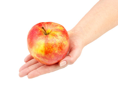 手中的红苹果。美味和健康的食物