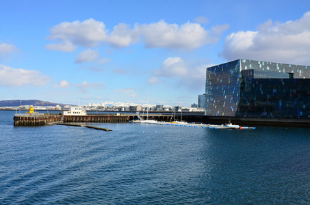 View of the city of Reykjavk ships sailing on the sea