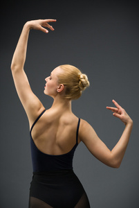 跳舞女芭蕾舞演员用手上的半身画像