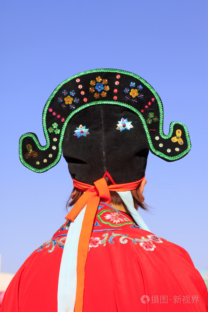 中国秧歌舞的年轻男子的帽子