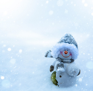 圣诞雪人和蓝色雪背景