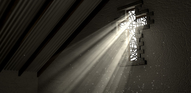 彩色玻璃窗户照亮的耶稣受难像光线照片