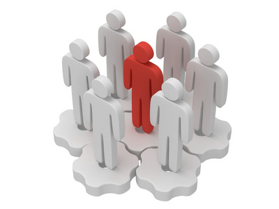 团队合作精神.一群程式化的人站在齿轮照片