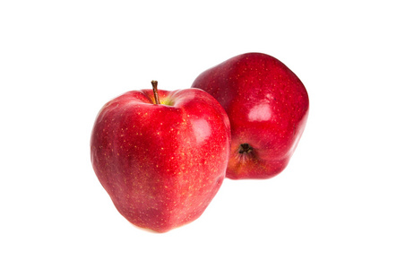 在白色背景上的两个红苹果