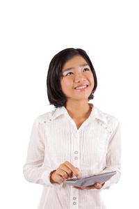 年轻的亚洲女孩，抱着一个计算器