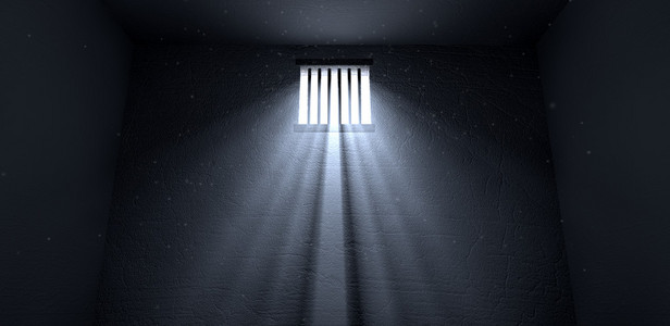 阳光照耀在监狱窗口中照片