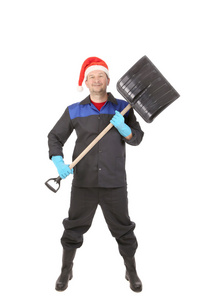 圣诞老人的帽子，用铁锹的工人