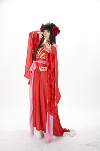 亚洲中国女孩的红色传统服装的舞者