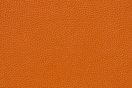 橙色的仿皮革纹理照片
