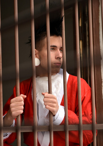 圣诞老人是在监狱的铁窗照片