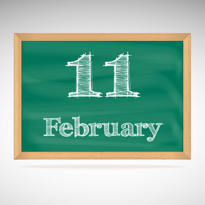 2 月 11 日，用粉笔在黑板上的题词