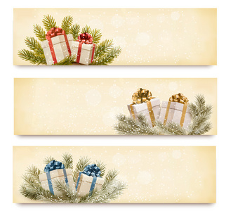 三个圣诞礼品盒和雪花横幅。矢量 il