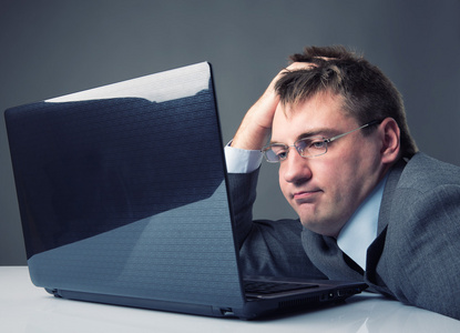 疲倦的上班族照片