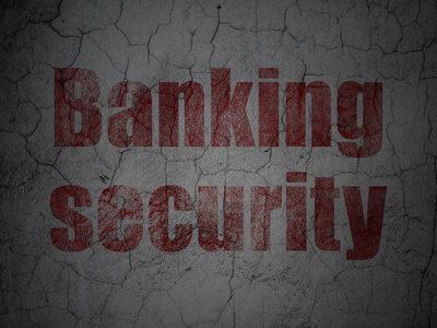 安全概念 银行对摇滚的背景墙上的安全