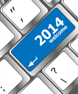 新的一年的概念 在电脑键盘上欢迎 2014年关键