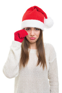 忧郁的年轻女子，与圣诞老人的帽子