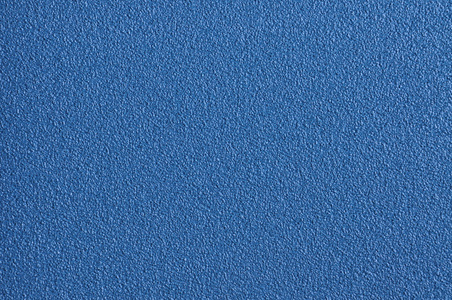 表面崎岖不平表面的蓝色砂纸照片