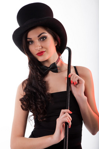 大礼帽拄着拐杖的女人照片