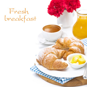 早餐羊角面包和黄油 咖啡和橙汁