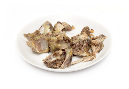 上一盘鸡骨头的残余物挑选的鸡骨头板上挑鸡骨头啃的鸡骨头关门从食物