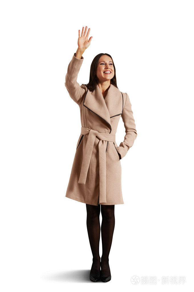 幸福的年轻女人挥手照片-正版商用图片1e7cav-摄图新视界