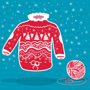 红色针织的圣诞毛衫和一个毛线球