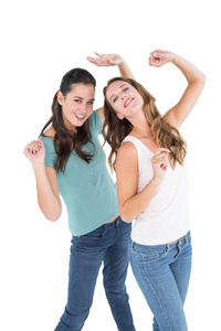 两个性格开朗年轻女性朋友跳舞