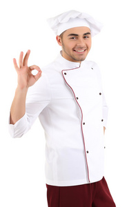 在白色的制服和帽子，孤立的白色衬底上专业厨师