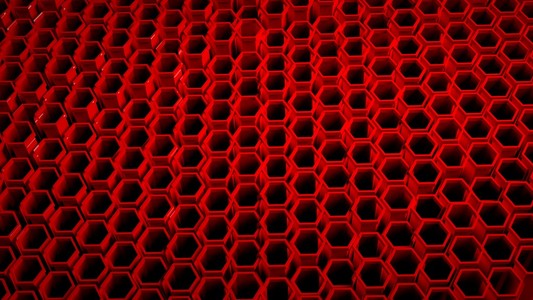 黑色蜂巢与 3d 红色蜂巢在黑色的背景照片